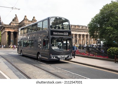 Edinburgh, Scotland - August 3rd,, 2021 : West Lotian Double Decker Bus Public Transport Vehicle On Princes Street With Scottish National Gallery Building In The Background