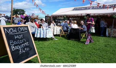 EDINBURGH, SCOTLAND - AUGUST 6, 2016 : People Have  Tea / Coffee And Snacks / Cake At Foodie Festival In Edinburgh, The UK's Biggest Food Festival.