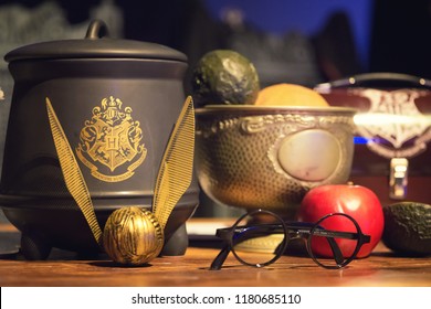 EDINBURGH, SCOTLAND - May 13, 2018: Display Of Harry Potter Related Objects : Glasses, Quidditch Ball And Pot.