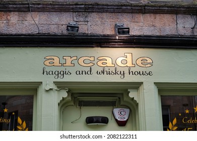 Edinburgh, Scotland- Nov 20, 2021: The Sign For Arcade Bar Haggis  Whisky House In Edinburgh.