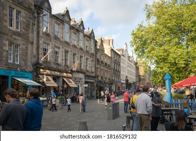 Edinburgh, Scotland, UK - August 24: View of Grassmarket area. Vibrant, picturesque and lively areas located in the Old Town with many restaurants and bars
