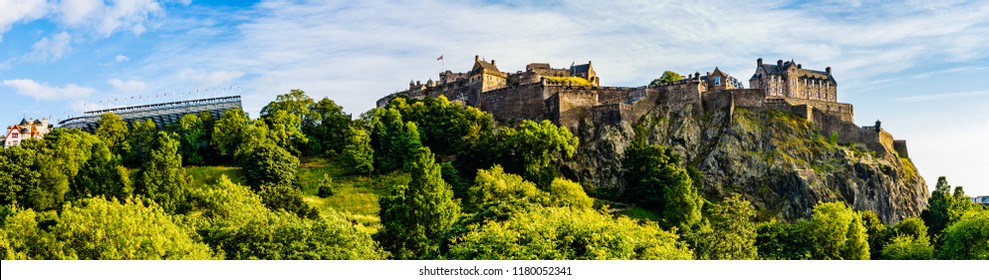 Edinburgh, Scotland, UK - August 25, 2018: Panorama of Edinburgh Castle dominating the skyline of the city of Edinburgh from its position on top of the Castle Rock