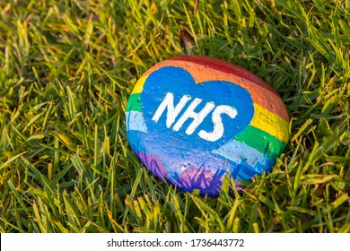 Edinburgh, UK - May 19, 2020: NHS Rainbow Tribute Painted On A Stone During The Coronavirus Pandemic