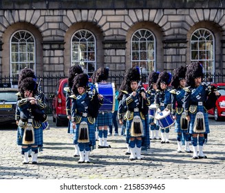 EDINBURGH, UNITED KINGDOM - Jun 10, 2018: A Closeup Of The Scottish Bagpipes Band With Blue Kilts In Edinburgh, Scotland, UK