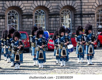 EDINBURGH, UNITED KINGDOM - Jun 10, 2018: A Closeup Of The Scottish Bagpipes Band With Blue Kilts, Edinburgh, Scotland, UK