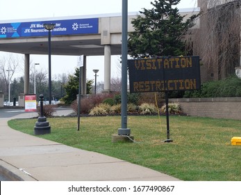 Edison, New Jersey/USA - March 19, 2020 - A Sign Depicting The Visitation Restrictions At The JFK Medical Center Due The Corona Virus COVID-19 . Restrictions Are At Most Hospitals In New Jersey.