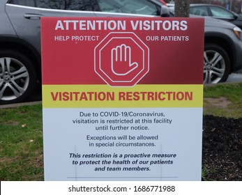 Edison, New Jersey-USA/March 27,2020-A Visitor’s Restriction Sign At A Hospital Parking Lot Due To The Corona/Covid-19 Virus Pandemic. Exceptions Were Allowed For Those With Special Circumstances.