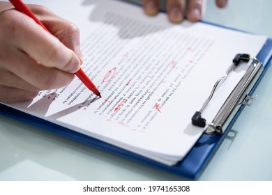 Editing Essay Content On Paper. Proofreader Marking Mistake