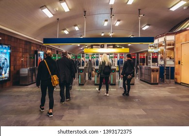 Editorial 03.27.2019 Stockholm Sweden. Passengers Walking Through The Baffle Gates At The Gärdet Subway Station