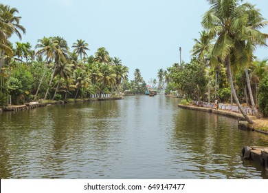 Editorial: ALAPPUZHA, KERALA, INDIA, April 9, 2017 - Navigating on a canal in Alappuzha with other houseboats