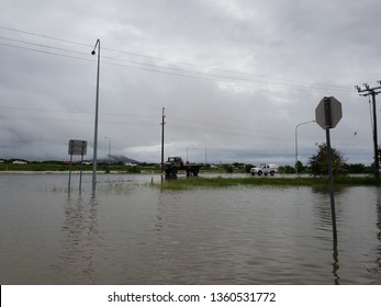 Editorial Flooded Street With Army Truck Driving By.Townsville, Australia- February 4, 2019. Largest Flooding Recorded In 100 Years. Twenty Thousand Homes Flooded. Natuaral Disaster Declared. Tho