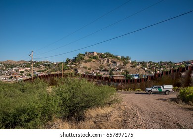 Editorial June 10, 2017 - Border Patrol Car On The US Side Of The International Border Between United States And Mexico