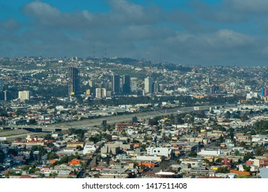 Editorial: March 22, 2019 - The City Of Tijuana, Mexico, Taken From A Hill Overlooking The Buildings And Architecture Of This Mexican Border Town. 