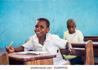 Editorial Use: Boy At School In Zanzibar, Tanzania, 04.2016. Children Face Tremendously Poor Life Conditions In Africa But The Interest In Education Is High. They Are Curious, Witty And Smart.