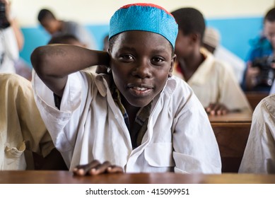 Editorial Use: Boy At School In Zanzibar, Tanzania, 04.2016. Children Face Tremendously Poor Life Conditions In Africa But The Interest In Education Is High. They Are Curious, Witty And Smart.