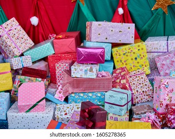 Editorial use only; beautifully wrapped colourful Christmas gifts, taken at Pathumthani, Thailand, in December 2019. - Shutterstock ID 1605278365