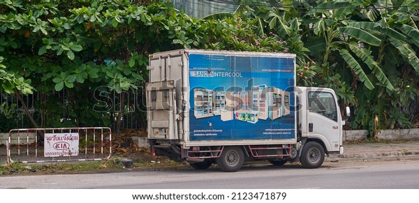 Editorial use only; a commercial truck with\
pictures of products and company logo printed on its side, then at\
Rangsit, Thailand, in February 2022.\
