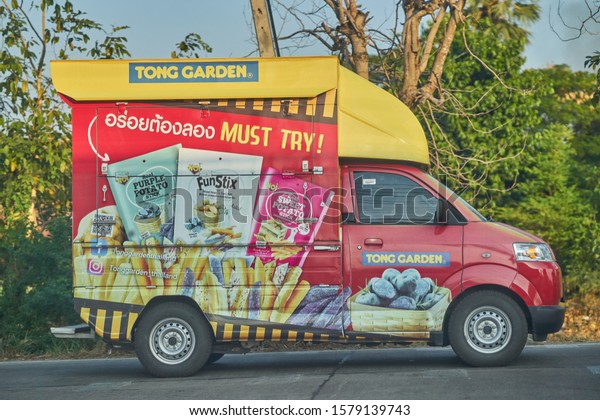 Editorial use only; a commercial van, with snack\
advertising and brand name on the side of the van, taken at\
Pathumthani, Thailand, in December\
2019.