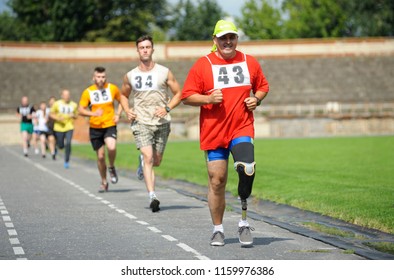 Editorial use only. Disabled athlete with an artificial leg running on a track. Trials among disabled Ukrainian soldiers to the 43 rd US Marine Corps marathon. July 20, 2018. Kiev, Ukraine