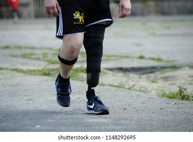 Editorial use only. Disabled runner with an artificial leg walking on a stadium. Trials among Ukrainian soldiers to the 43 rd US Marine Corps marathon. July 20, 2018. Kiev, Ukraine