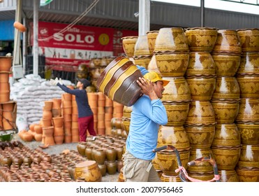 Editorial Use Only; Flowerpots Being Unloaded From A Truck At A Garden Center, Taken At Pathumthani, Thailand, In August 2018.                         