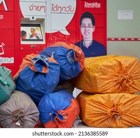 Editorial use only; large bags of mail outside a Thai post office, taken at Pathumthani, Thailand in March 2021.      