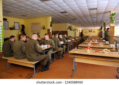 Editorial Use Only. At A Mess Hall: Soldiers Sitting At Set-out Tables And Eating. November 12, 2018. Novo-Petrivtsi Military Base, Ukraine