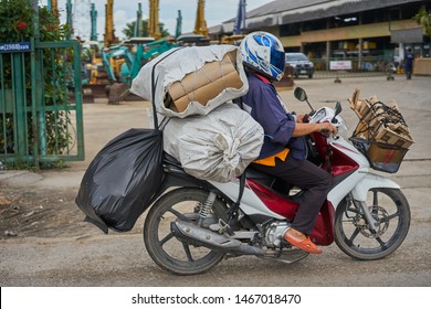 Editorial use only; an overloaded motorcycle, belonging to a recycle collector, taken at Pathumthani, Thailand, in July 2019.    
