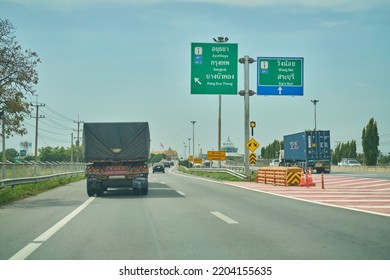 Editorial Use Only; Road Information Sign Over A Highway, In English And Thai Script, Taken At Ayutthaya, Thailand, In May 2022.