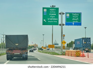 Editorial Use Only; Road Information Sign Over A Highway, In English And Thai Script, Taken At Ayutthaya, Thailand, In May 2022.