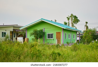 Editorial Use Only; A Small Simple House In A Green Grass Background, Taken At Pathumthani, Thailand, In May 2022.