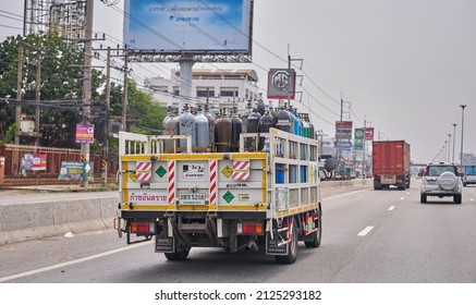 Editorial Use Only; A Truck Carrying Hazardous Gas Cylinders, With Warning Signs On Background Of Truck, Taken At Bangkok, Thailand In February, 2022.