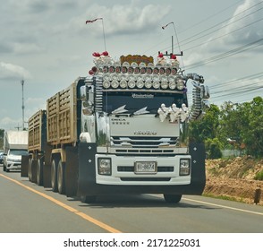Editorial use only; a truck with many headlamps on a rural road, taken at Sisaket, Thailand, in June 2022. 