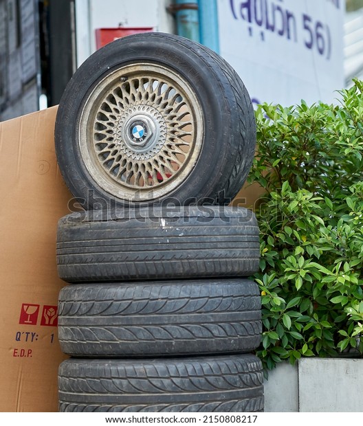 Editorial use only;\
used car tire display at a service garage, taken at Chonburi,\
Thailand, in April,\
2018.