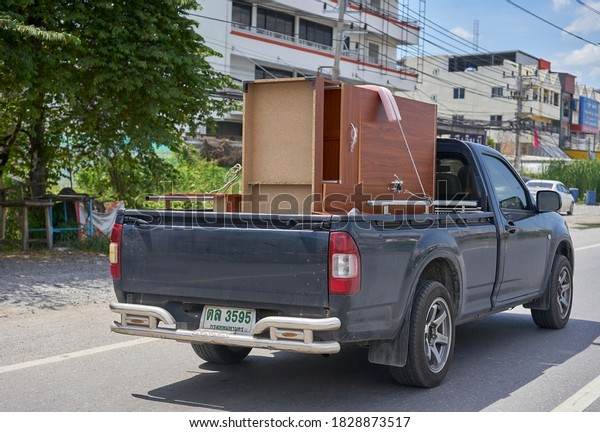 Editorial use only; wooden furniture being\
transported in a pickup truck, taken at Pathumthani, Thailand in\
September 2020.                        \
