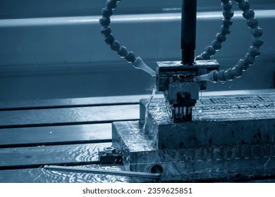 The EDM machine working process with graphite electrode. The mold and die manufacturing process by Electrode Discharge Machine.