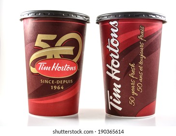 EDMONTON AB, CANADA. APRIL 13, 2014: Tim Hortons cups depicting celebrations of fifty years of existence