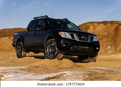 Edmonton, Alberta- 20 March 2020
2019 Nissan Frontier Pro 4x Parked In Piles Of Saw Dust, Early Spring