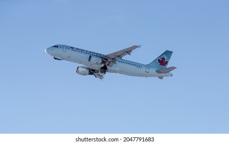 Edmonton, Alberta, Canada. December 01, 2019. An Air Canada Airbus A320, With Identification C-FDCA, Taking Off From Edmonton International Airport