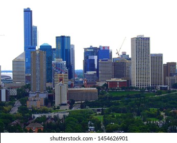 Edmonton, Alberta, Canada - July 2019: Edmonton Downtown Summer Skyline Just Before Sunset At The Day Hour Showing River Valley Parks And Surrounding Skyscrapers.