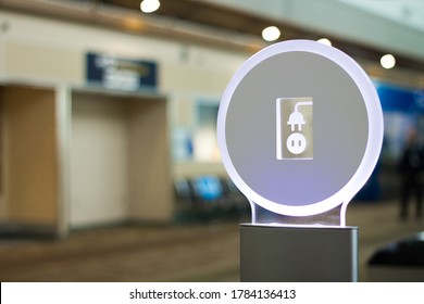 Edmonton, Alberta / Canada - July 23, 2020: Charging Station Lit Up In Edmonton International Airport Domestic-International Area. 