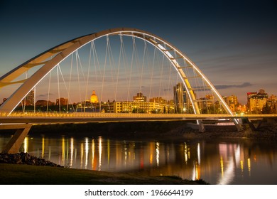 Edmonton, Alberta Canada - May 25 2019: Walterdale architectural bridge structure at beautiful evening sunset night at Saskatchewan river valley