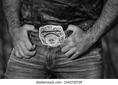Edmonton, Alberta, Canada - October 15, 2017: Closeup of cowboy belt buckle being worn by a cowboy.