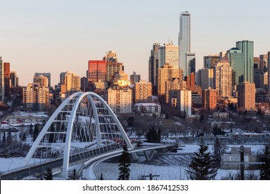 Edmonton, Alberta - December 03, 2020: Sunrise over Edmonton's downtown with the Walterdale bridge visible in the foreground.