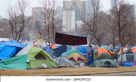 Edmonton, Alberta/Canada- October 18th 2020; Homeless people in Edmonton city, opposite Re/Max field. Many will not stay in shelters due to covd. 19 coronavirus. Now they face extreme winter cold.