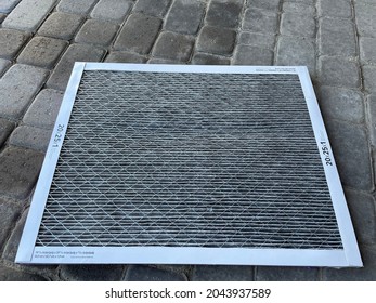 Edmonton, Canada - August 28, 2021: A Dirty Filtrete Furnace Filter