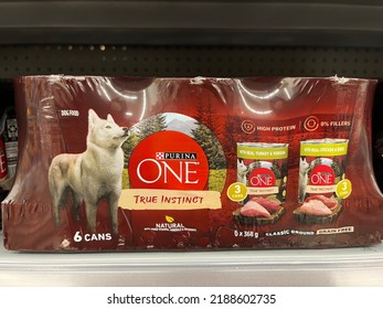 Edmonton, Canada - August 4, 2022: A Six Pack Of Purina One True Instinct Cans Of Dog Food On Display On A Pet Store Shelf