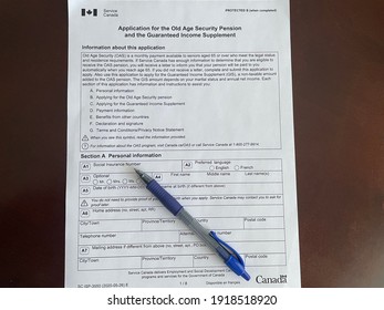 Edmonton, Canada - February 15, 2021: A Service Canada Application For The Old Age Security Pension And The Guaranteed Income Supplement With A Pen On It 