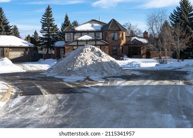 Edmonton, Canada,  January 27, 2022:Snow Pile Made After Street Snow Cleaning