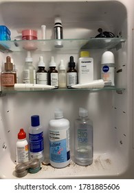 Edmonton, Canada - July 10, 2020: Various Skincare Products And Toiletries In A Medicine Cabinet
